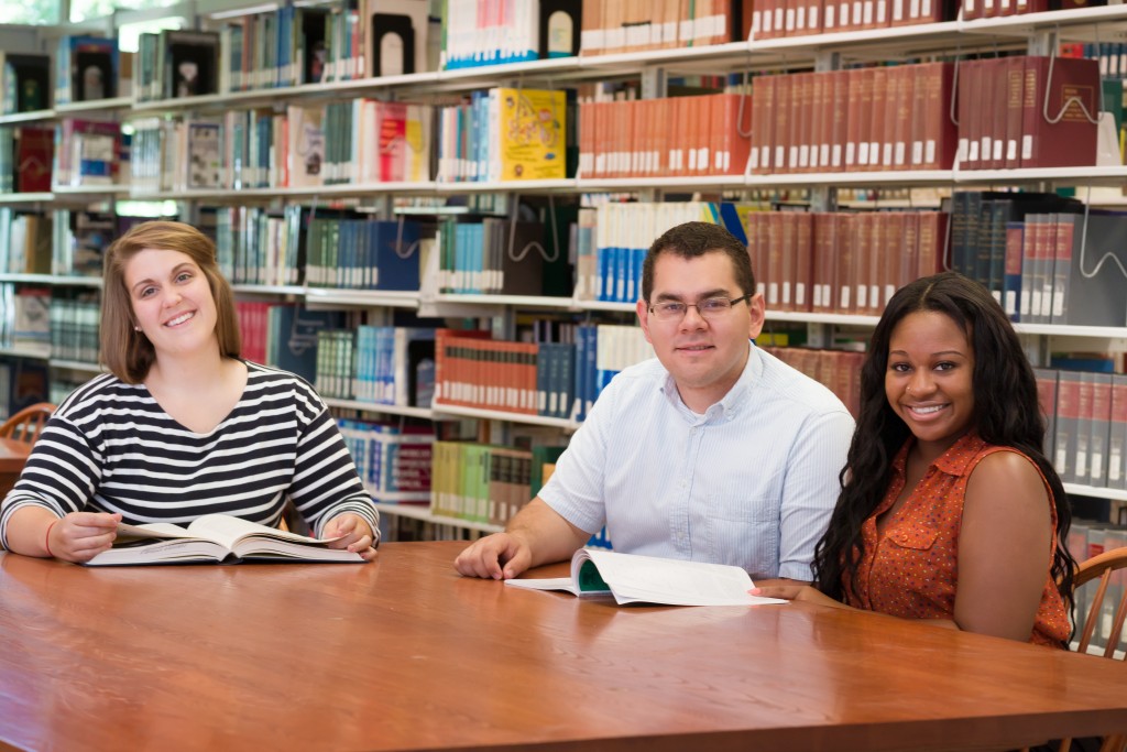 Angela, Robert, Erica in the Library